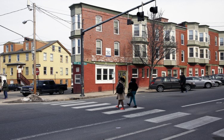 The new owner plans to develop properties close to a day shelter and soup kitchen – 19 Preble St., right, and 255 Oxford St., left. A reader says the changes in Bayside shouldn't leave the needy behind.
