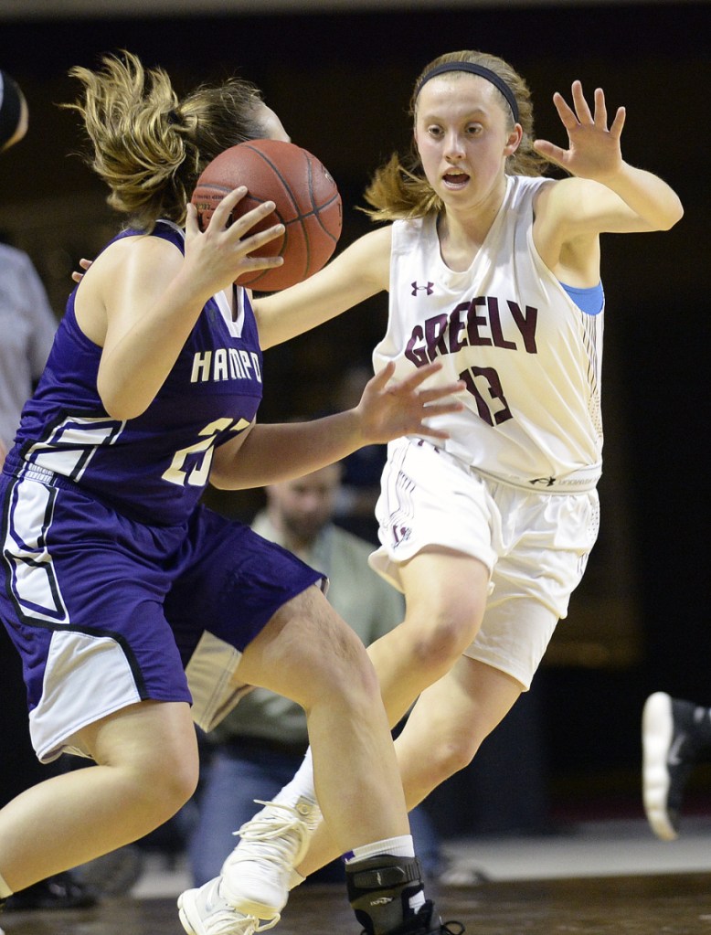 PORTLAND, ME - MARCH 1: Greely's Brooke Obar plays defense on Hampden Academy's Braylee Wildman Thursday, March 1, 2018. (Staff photo by Shawn Patrick Ouellette/Staff Photographer)