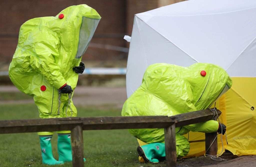 Personnel in hazmat suits work at the scene of a nerve agent attack on a former Russian spy and his daughter in Salisbury, England, on Sunday.