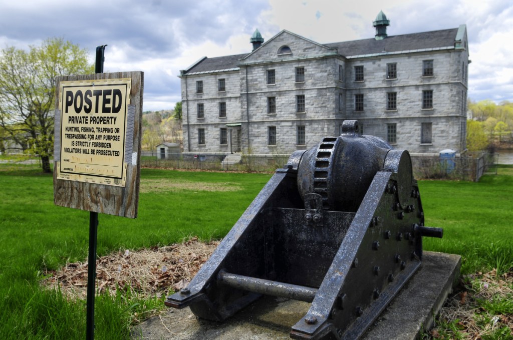The vacant Kennebec Arsenal stands on the east bank of the Kennebec River in Augusta, where a group proposes to build a substance abuse treatment facility for veterans.