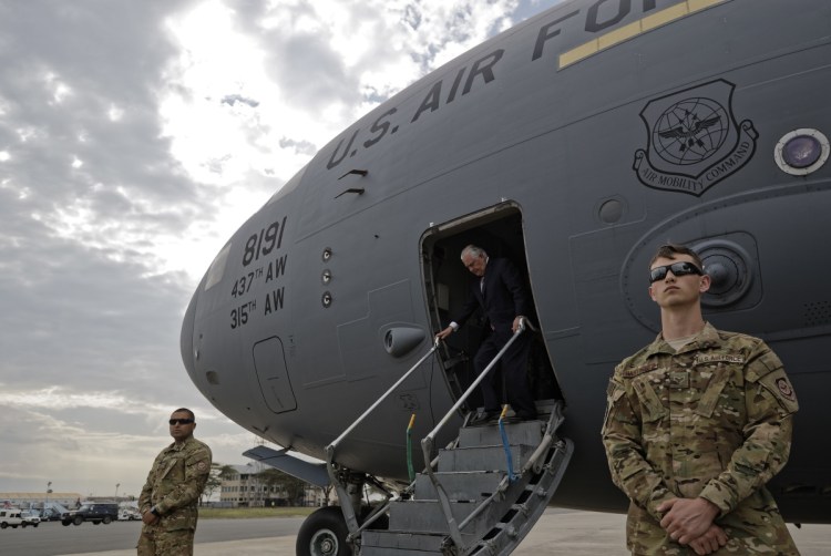 U.S. Secretary of State Rex Tillerson steps down from a U.S. Air Force plane on his arrival in Nairobi, Kenya, on Friday. On this African mission, the diplomat is visiting five nations: Chad, Djibouti, Ethiopia, Kenya and Nigeria.