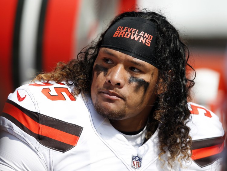 Cleveland Browns nose tackle Danny Shelton sits on the sideline during a game against the Pittsburgh Steelers in Cleveland. A person familiar with the negotiations said Saturday that the Browns have agreed to trade Shelton to the New England Patriots for a conditional draft pick.