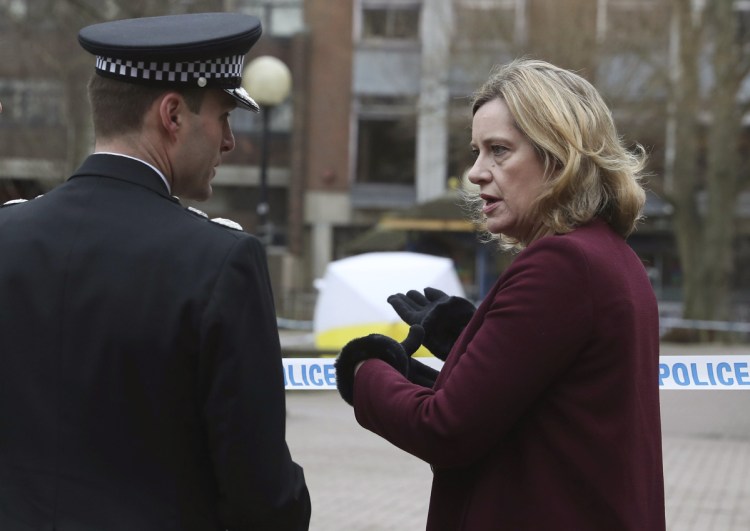 Britain's Home Secretary Amber Rudd talks with Wiltshire Police Assistant Chief Constable Kier Pritchard in Salisbury, where former Russian double agent Sergei Skripal fell ill.
