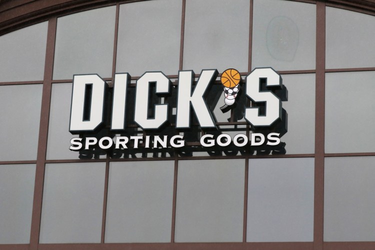 A sign for Dick's Sporting Goods store is displayed at the store in Madison, Miss. Dick's Sporting Goods stock was down early Tuesday after it reported lower-than-expected fourth quarter sales.