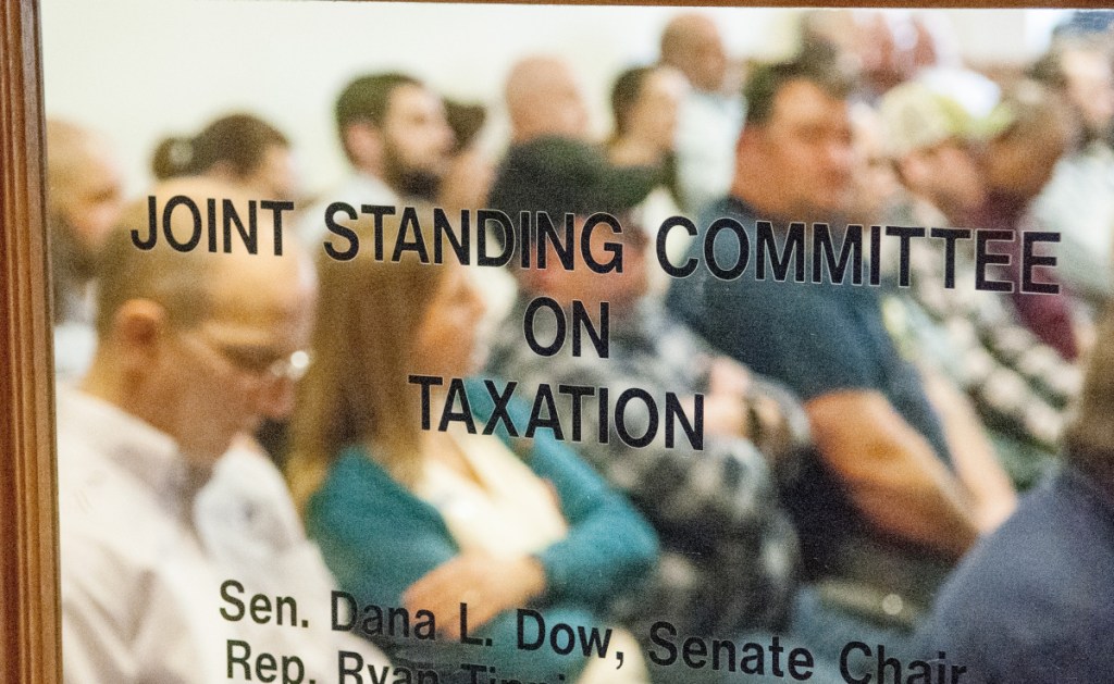 Supporters of L.D. 1781 fill the Taxation Committee hearing room last week at the State House. Lawmakers should be careful when considering a bill to bring Maine tax law into conformity with the federal tax law passed this year.