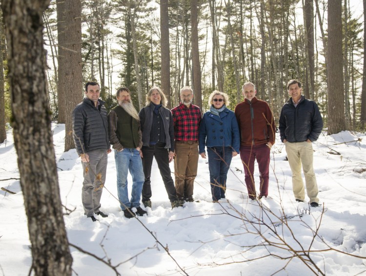 From left: Tom Abello, director of external affairs at The Nature Conservancy; Morten Moesswilde, midcoast district forester; Theresa Kerchner, executive director of Kennebec Land Trust; Harold Burnett, forester and owner of Two Trees Forestry; Nancy Smith, executive director of GrowSmart Maine; Lee Burnett, project manager at Local Wood WORKS; and Warren Whitney, land trust program director at Maine Coast Heritage Trust. Not present for the photo, which was taken at Kennebec Estuary Land Trust's Sewall Woods, a Demonstration Forest in Bath, are, Ken Laustsen, biometrician at the Maine Forest Service, Keith Bisson, president of Coastal Enterprises Inc.; Kirsten Brewer, director of membership and programs at Kennebec Land Trust; and Mike Wilson, senior program director at Northern Forest Center. 