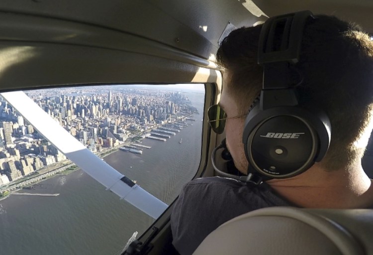 Aaron Ludomirski, a certified flight instructor for Infinity Flight Group, flies over the Hudson River in New York. Major U.S. airlines are hiring pilots at a rate not seen since before 9/11, and that is encouraging more young people to consider a career in the cockpit.