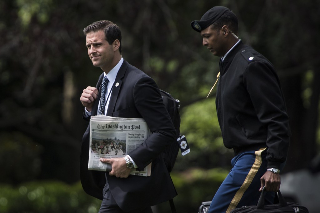 White House aide John McEntee was escorted off the White House grounds.