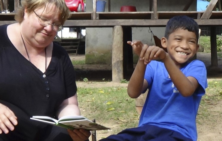 Judy Shepard-Kegl studies the sign language skills of a deaf boy in Bilwi, Nicaragua, in 2017. She came to Maine 20 years ago to help start USM's American Sign Language interpreting program.