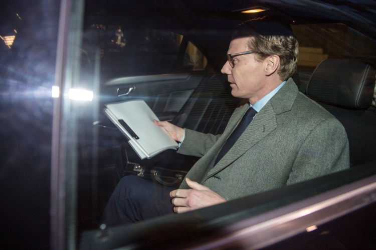 Alexander Nix, chief executive officer of Cambridge Analytica, leaves the company's offices in London on Tuesday. The company's board said it suspended Nix, effective immediately, while an independent investigation is conducted. MUST CREDIT: Bloomberg photo by Chris J. Ratcliffe