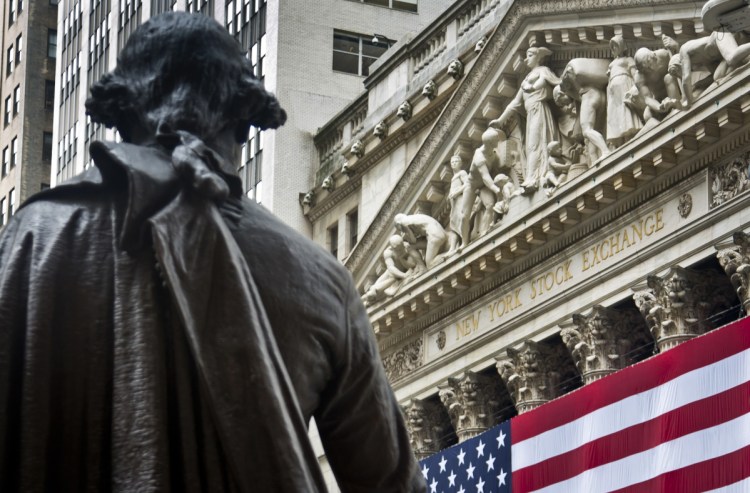 Federal Hall's George Washington statue stands near the flag-covered pillars of the New York Stock Exchange. Stocks of smaller companies have held up better than larger ones during the recent tumult over tariffs, in part because they do more of their business inside the U.S. and have less to fear from international trade disputes.