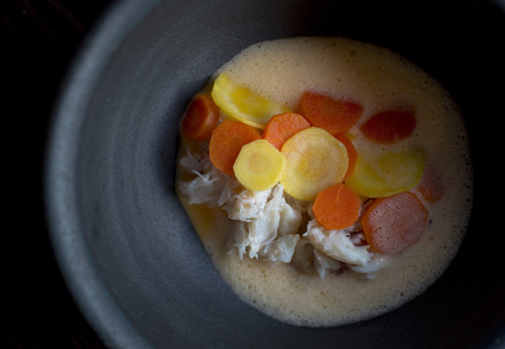 Warm crab with scrambled egg, crab chili foam and carrots may well be the signature dish at Elda. 