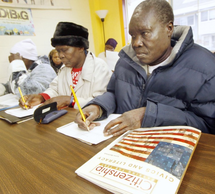 Peter Aboda and other Sudanese refugees and immigrants take a civics class in Maine in 2011, when there was more resettling.