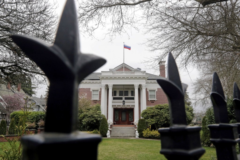 A metal fence surrounds the residence of Russia's consul general in Seattle. The United States on Monday kicked out Russian diplomats and ordered Russia's consulate in Seattle to close, as the West sought joint punishment for Moscow's alleged role in poisoning an ex-spy in Britain.