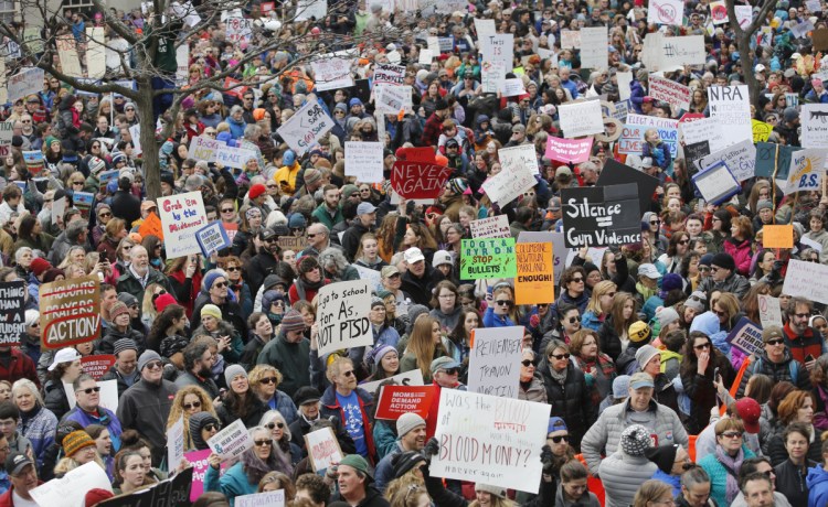 Thousands join in the March for Our Lives protest at City Hall in Portland on Saturday. While young people took to the streets to protest a lack of government action, a ban on public health research has been lifted.