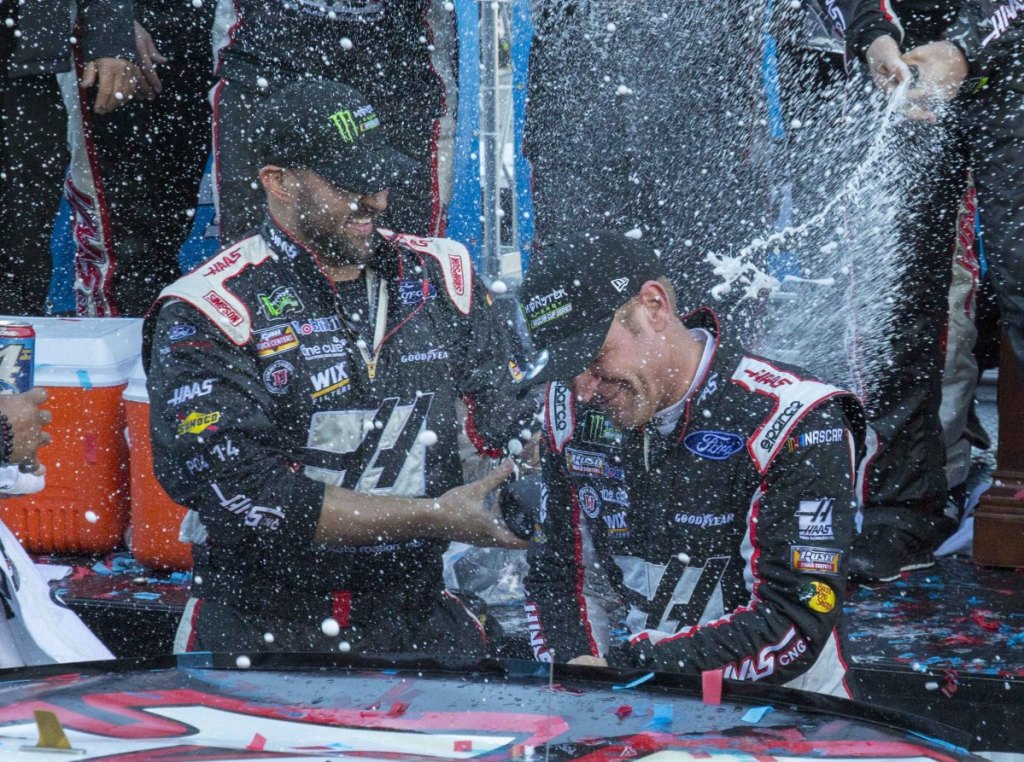 Clint Bowyer, right, celebrates with his crew Monday after winning a NASCAR Cup Series race at Martinsville Speedway in Virginia, snapping a 190-race losing streak over six years.