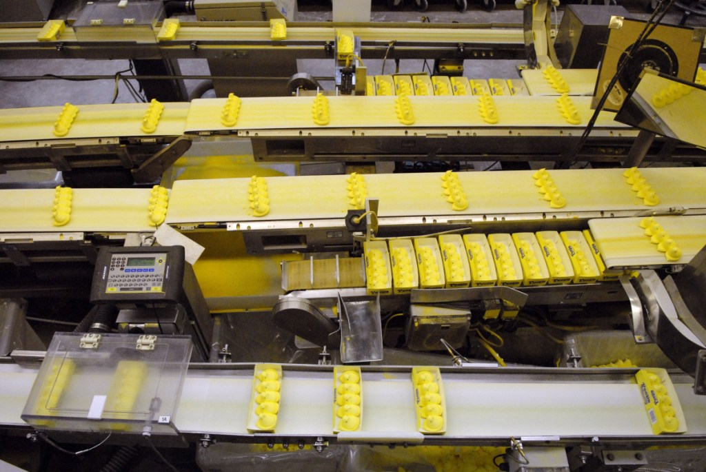 Peeps chicks move down a conveyor belt to be boxed and shipped at the Just Born plant in Bethlehem, Pa. MUST CREDIT: