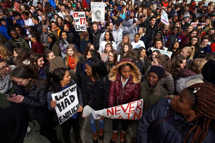 Portland High School and Baxter Academy students staged a walkout and 17-minute silence at City Hall on Thursday in the wake of a recent school shooting that left 17 dead in Florida. The event comes one day after a national walkout, but had been postponed in Portland due to snow-related school cancellations. 
