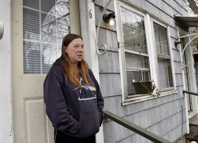 Heather Parker talks on Wednesday about Vaughan Orchard, who was staying in the apartment above hers on Silver Place in Waterville. Orchard, who for years was homeless, died of an apparent heart attack last Saturday.