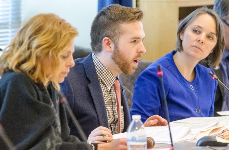 Rep. Ryan Fecteau, flanked by  Sen. Amy Volk (left) and Sen. Shenna Bellows (right) has requested that the Government Oversight Committee launch an investigation into the Department of Labor's unemployment insurance filing system and management. 