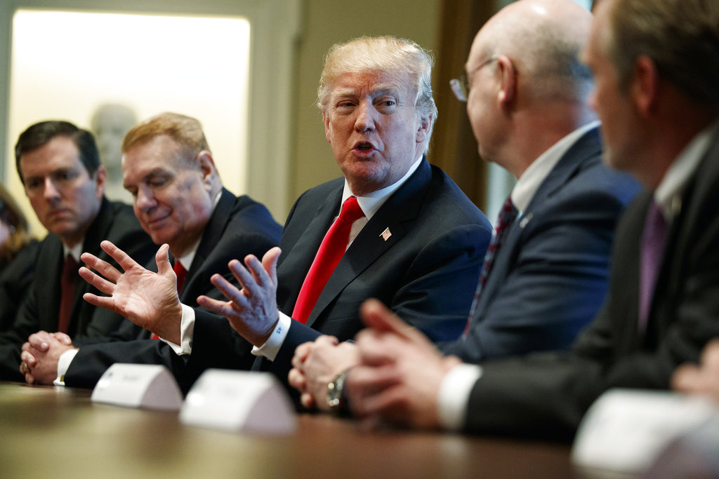 President Trump speaks to steel and aluminum executives in the Cabinet Room of the White House, Thursday. From left, Roger Newport of AK Steel, John Ferriola of Nucor, Trump, Dave Burritt of U.S. Steel Corp., and Tim Timkin of Timken Steel. 