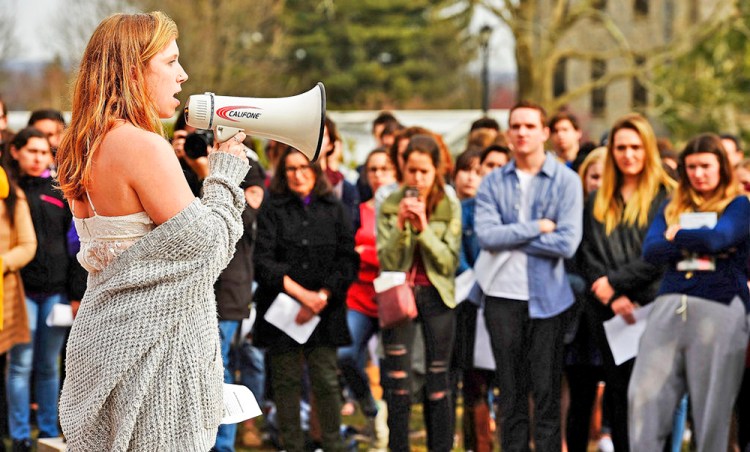 Alison Joyce takes her turn at the megaphone as students at Connecticut College in New London, Conn., rally against gun violence Thursday. A nationwide student walkout to protest gun violence is planned for March 14. 