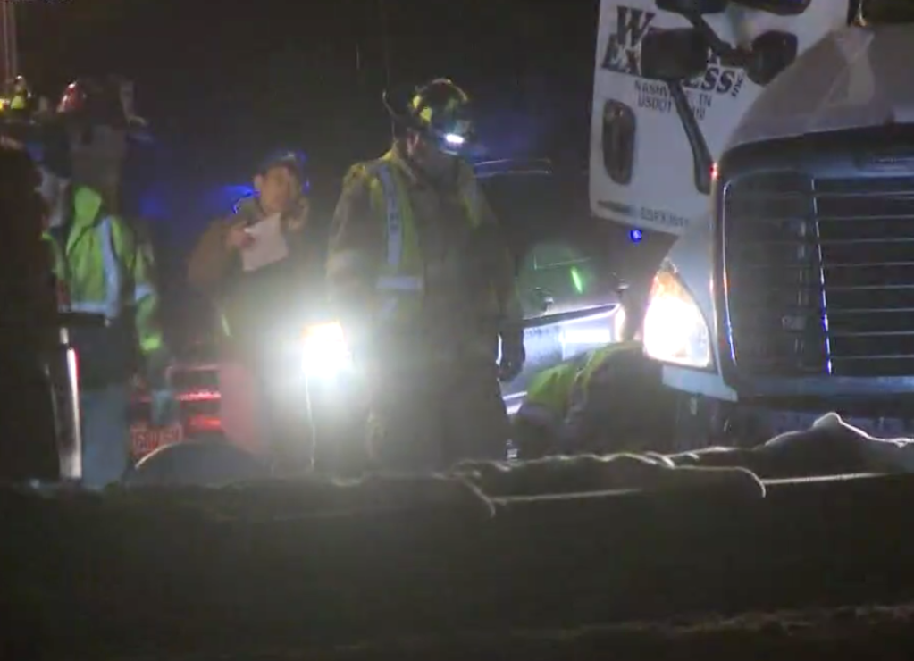 First responders work Thursday night at the scene of the crash on the Maine Turnpike.