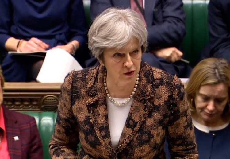 Britain's Prime Minister Theresa May speaks in the House of Commons in London on Monday, when she said her government has concluded it is "highly likely" Russia is responsible for the poisoning of an ex-spy and his daughter. May said that Sergei Skripal and his daughter, Yulia, were exposed to a nerve agent developed in the Soviet Union in the end of the Cold War. 
