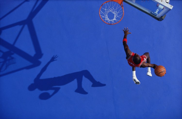 "Blue Dunk" (Michael Jordan), 1987 (printed later), archival pigment print, 20 by 24 inches.
