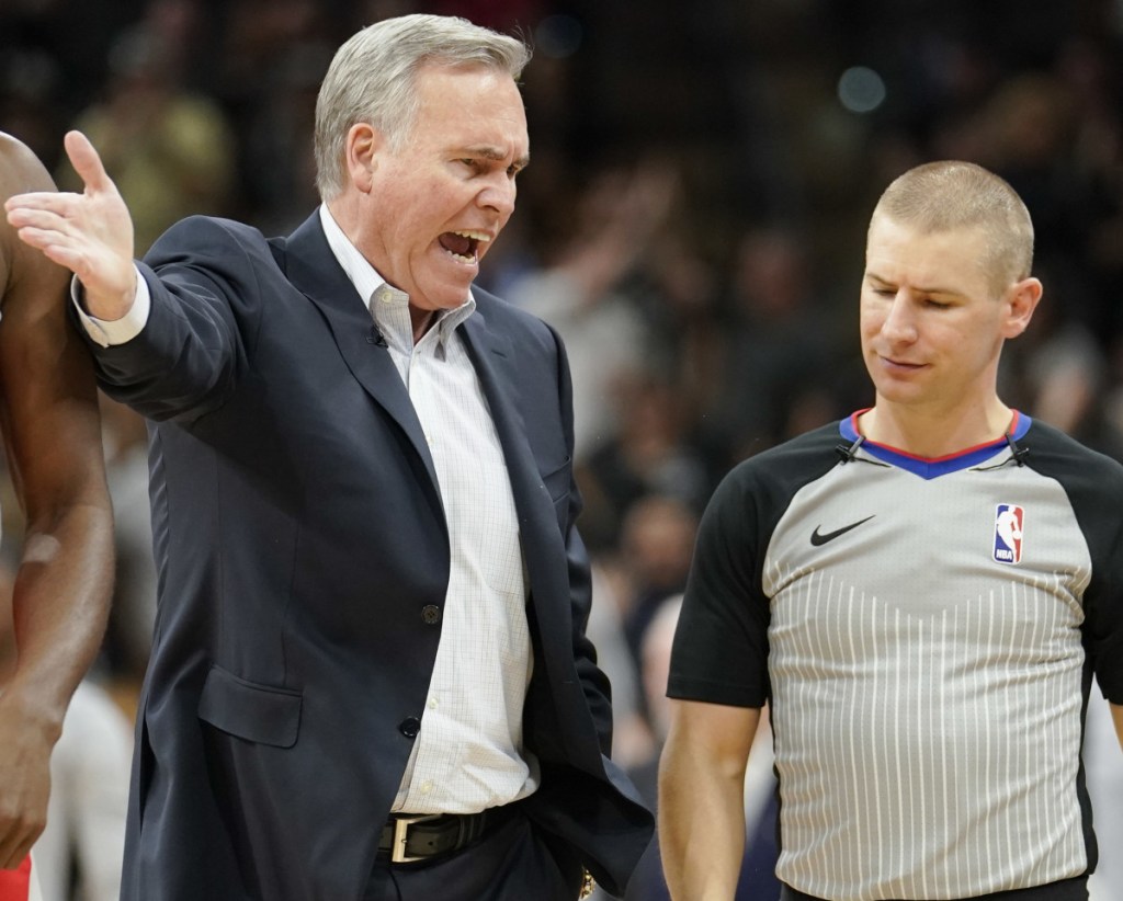 Houston Coach Mike D'Antoni argues with referee Tyler Ford during the first half of a 100-83 loss Sunday to the San Antonio Spurs. It was Houston's lowest-scoring game of the season.