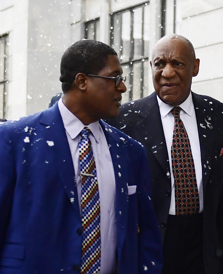 Bill Cosby, right, arrives for jury selection in his sexual assault retrial with spokesperson Andrew Wyatt.