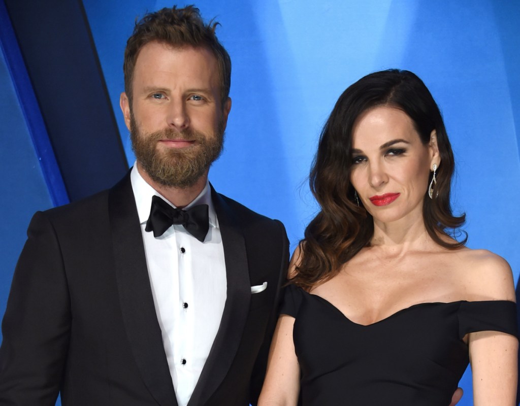 Dierks Bentley, left, and his wife Cassidy Black arrive at the 51st annual CMA Awards in Nashville, Tenn, last year. Bentley said he hopes "Woman, Amen," will counter some of his other work.