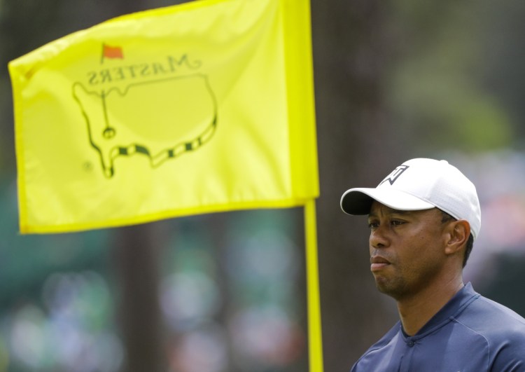 Tiger Woods played a practice round Wednesday for the Masters in Augusta, Ga., where he'll be up against some top young players who idolized him growing up.