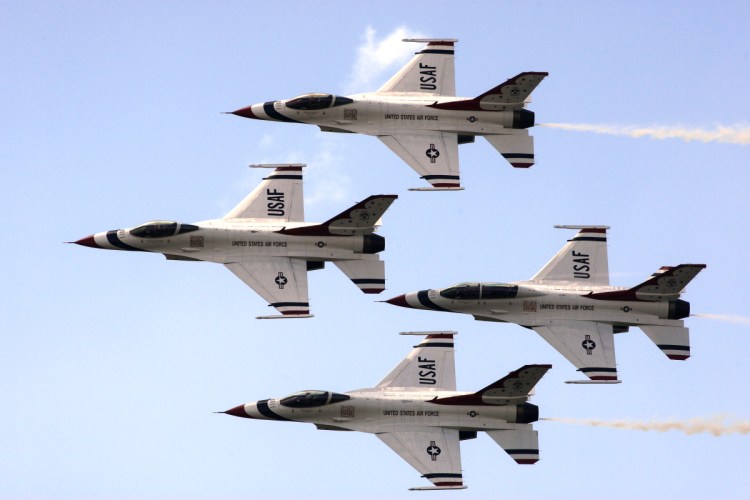 The U. S. Air Force Thunderbirds practice a maneuver during a rehearsal in 2010.