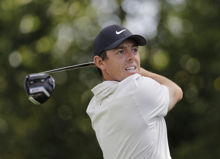 Rory McIlroy hits a drive on the second hole during the second round at the Masters Friday in Augusta, Ga.