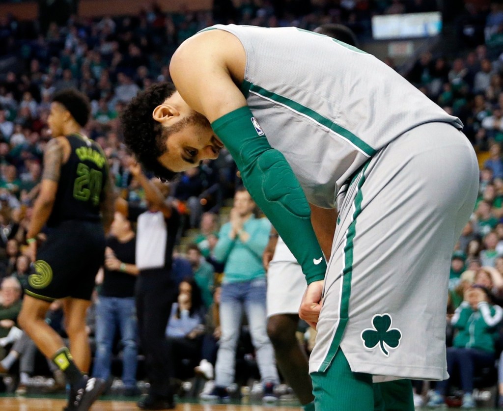 Shane Larkin of the Boston Celtics reacts Sunday after missing a layup in the final 10 seconds that would have pulled the team within two points of the Atlanta Hawks.