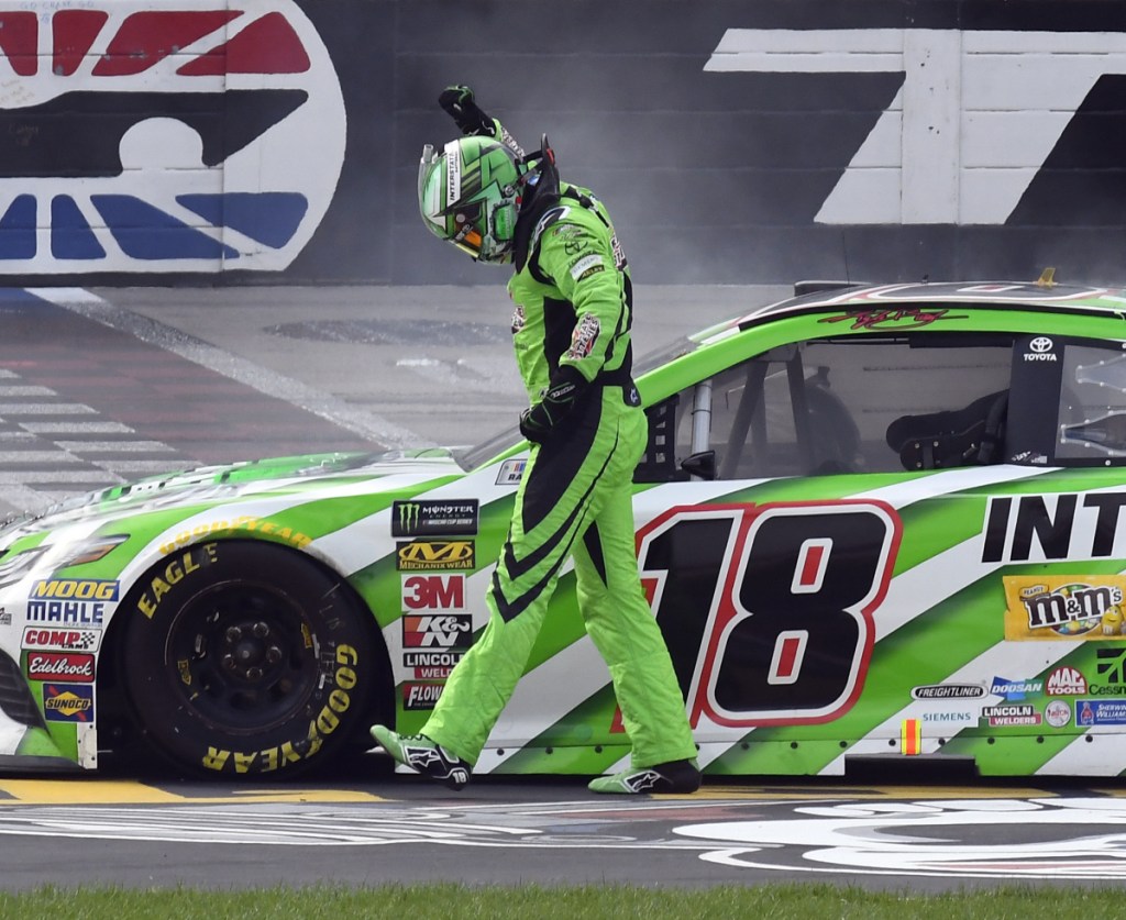Kyle Busch celebrates after winning Sunday's NASCAR Cup Series race in Fort Worth, Texas. It was only the 10th race since his last victory, but he'd had a lot of close calls since.