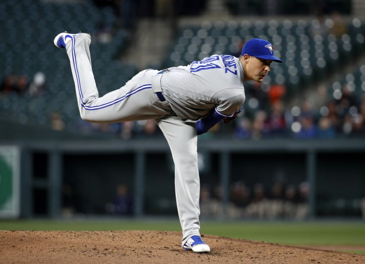 Blue Jays starter Aaron Sanchez lost his a no-hitter in the eighth inning, but still got the win when Toronto edged the Orioles 2-1 in Baltimore.