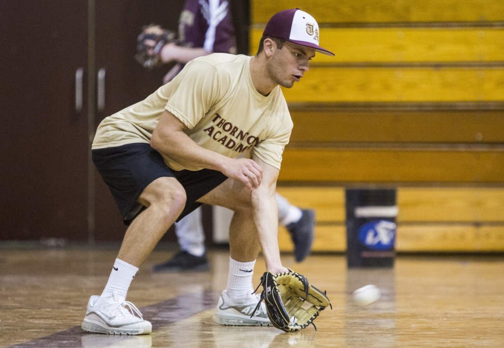 Brogan Searle-Belanger, a senior third baseman/pitcher, is part of a talented Thornton Academy team learning from a rookie coach who came close to reaching the major leagues.