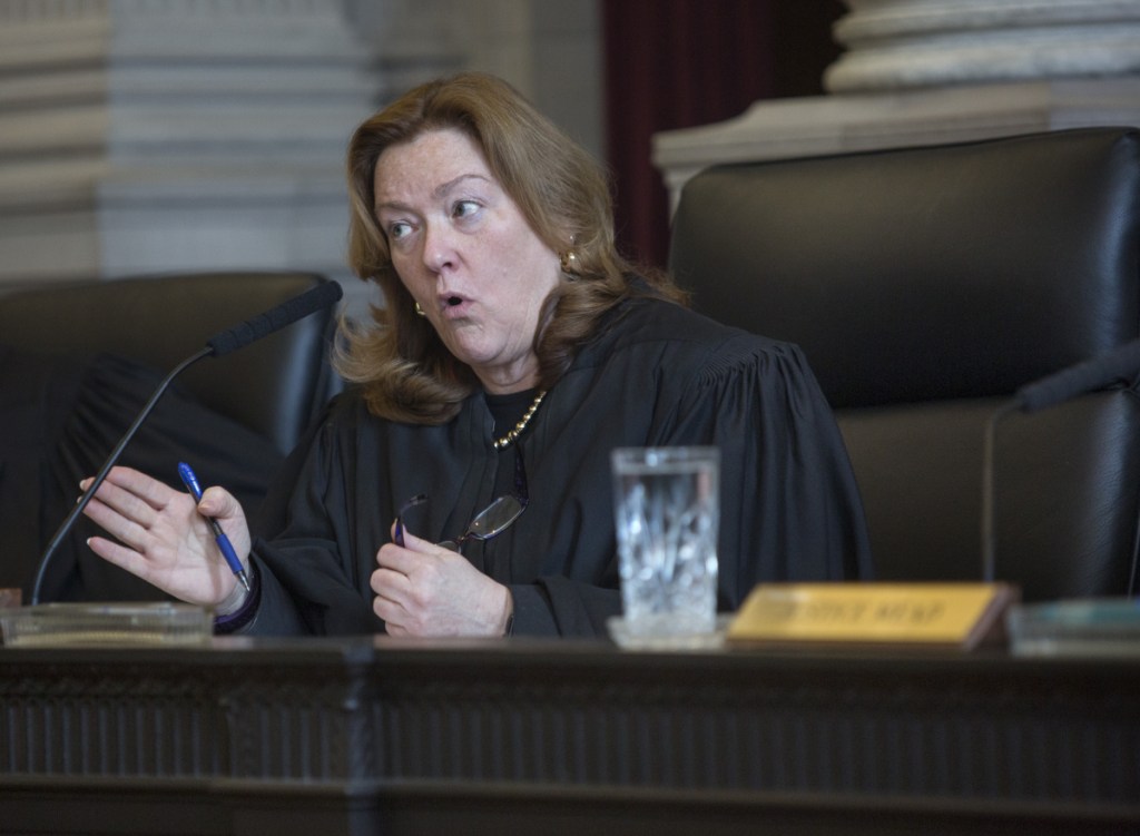 Chief Justice Leigh Saufley questions the state Senate’s attorney, Tim Woodcock. She asked why the Legislature had not fixed issues with the Ranked Choice Voting Act.
