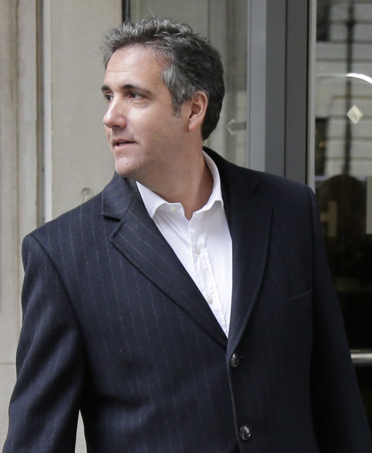 Michael Cohen returns to the hotel where he has been staying in New York, Wednesday. 