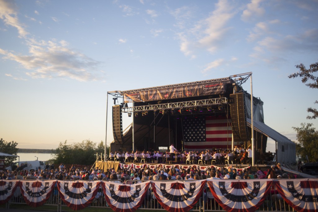 The Portland Symphony Orchestra plays at the Fourth of July celebration on the Eastern Promenade in Portland. The PSO won't be hired this year because of a lack of funds.