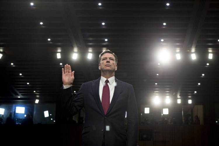 Former FBI director James Comey, above being sworn in at a Senate Intelligence Committee hearing in Washington in June 2017, details his discussions with President Trump in his new book.