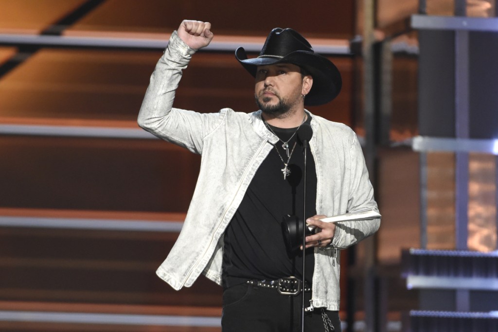 Jason Aldean accepts the award for entertainer of the year at the 53rd annual Academy of Country Music Awards on Sunday in Las Vegas.