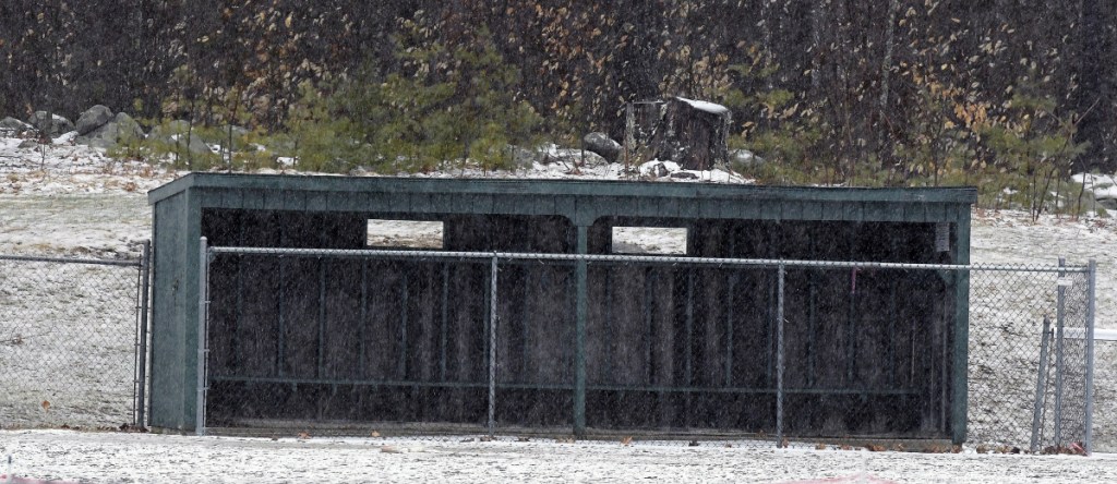 Staff photo by Andy Molloy 
 The Hall-Dale High School softball field, like most across the state, is covered in snow and ice Monday in Farmingdale.