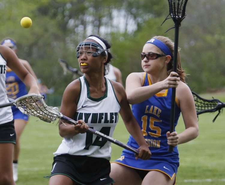 Ya Stockford of Waynflete, left, is one of the biggest threats on a team that will pose a danger for Class B opponents. Stockford, a senior, is a team captain and unselfish player with plenty of speed.