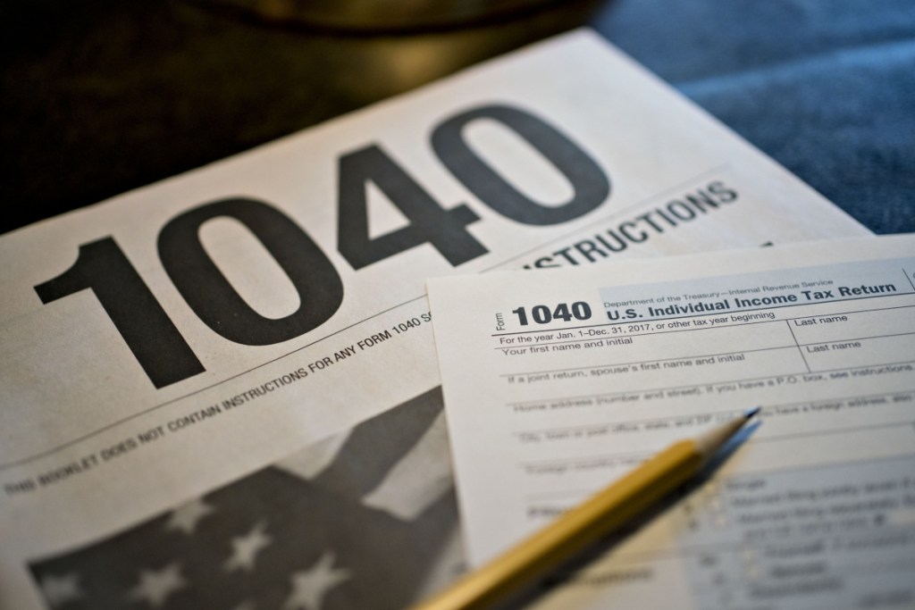 1040 Individual Income Tax forms for the 2017 tax year. MUST CREDIT: Bloomberg photo by Daniel Acker