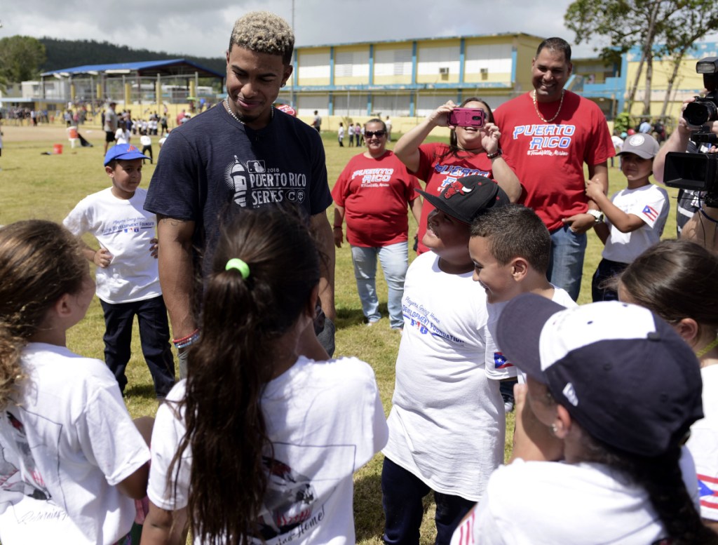 Cleveland shortstop Francisco Lindor visits his former grammar school, Villa Marina Elementary School, in Gurabo, Puerto Rico on Monday. Cleveland and Minnesota are playing two games at Hiram Bithorn Stadium.