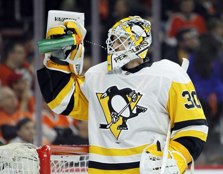 Pittsburgh Penguins' Matthew Murray has some water during a break in the second period in Game 4 against the Philadelphia Flyers on Wednesday in Philadelphia. The Penguins won 5-0.
