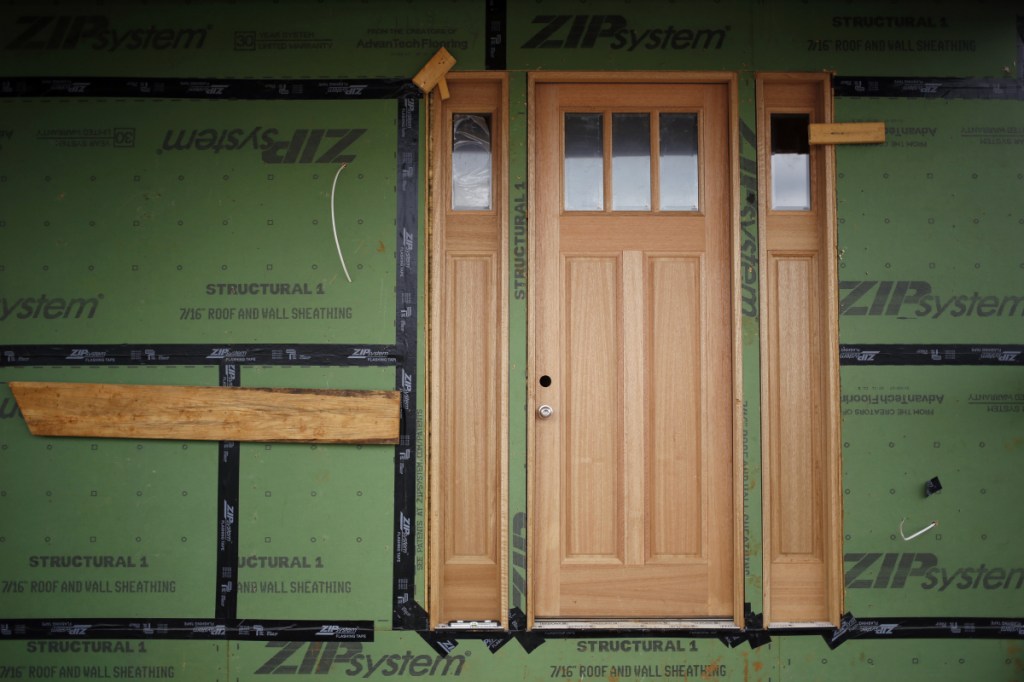 The front door of a home under construction is seen in Louisville, Ky., in March. MUST CREDIT: Bloomberg photo by  Luke Sharrett.